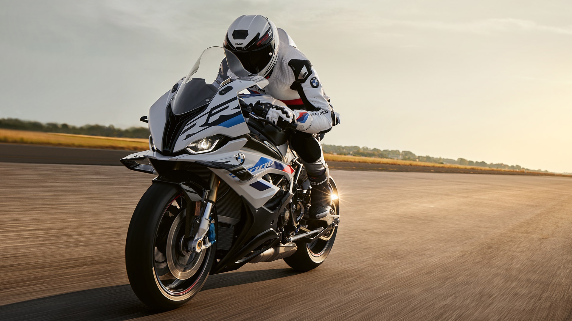 A BMW S 1000 RR being ridden on a road